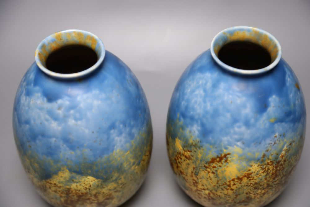 A pair of Crown Ducal mottled vases, height 20cm and a Belgian vase, all with abstract glaze effects